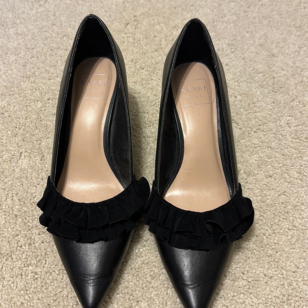 Kaari Blue Ruffle Black Pumps